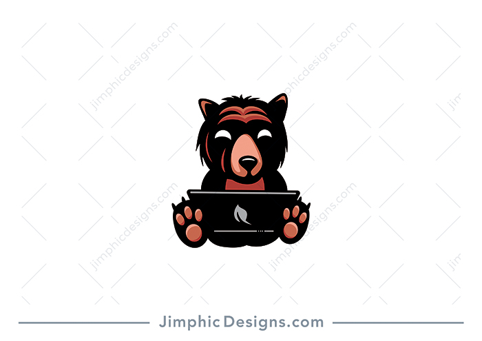 Cute little bear sitting with a laptop on his lap and a smile in his face.